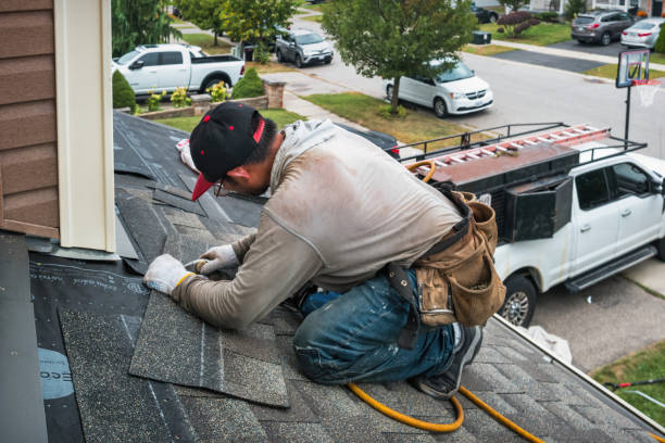 Professional Roofing technician working in Roans Prairie, TX